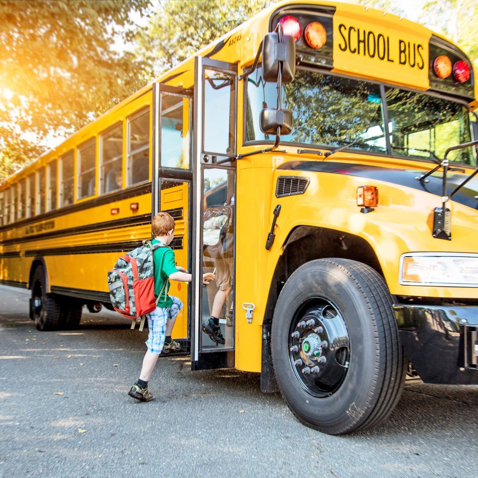 A school bus arriving with students